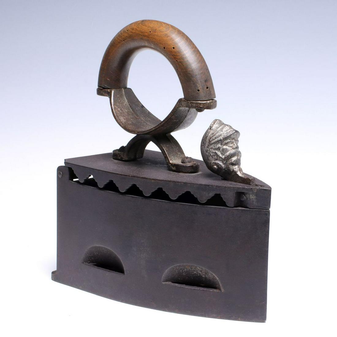 A LATE 19TH CENTURY K-K-O CHARCOAL IRON W/ WARRIOR (1 of 11)