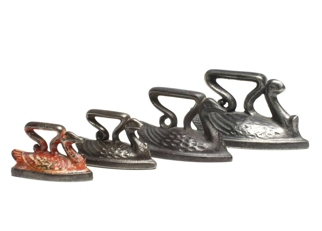 FOUR FIGURAL SWAN SAD IRON MINIATURES (1 of 10)