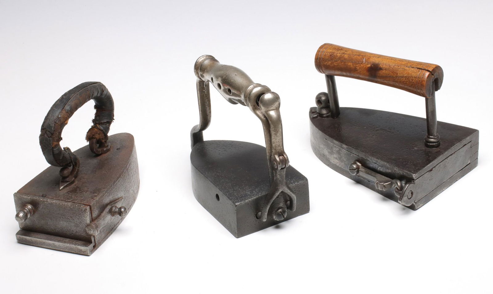 ANTIQUE BOX IRONS AND SAD IRON WITH REVOLVING PLATE (1 of 10)