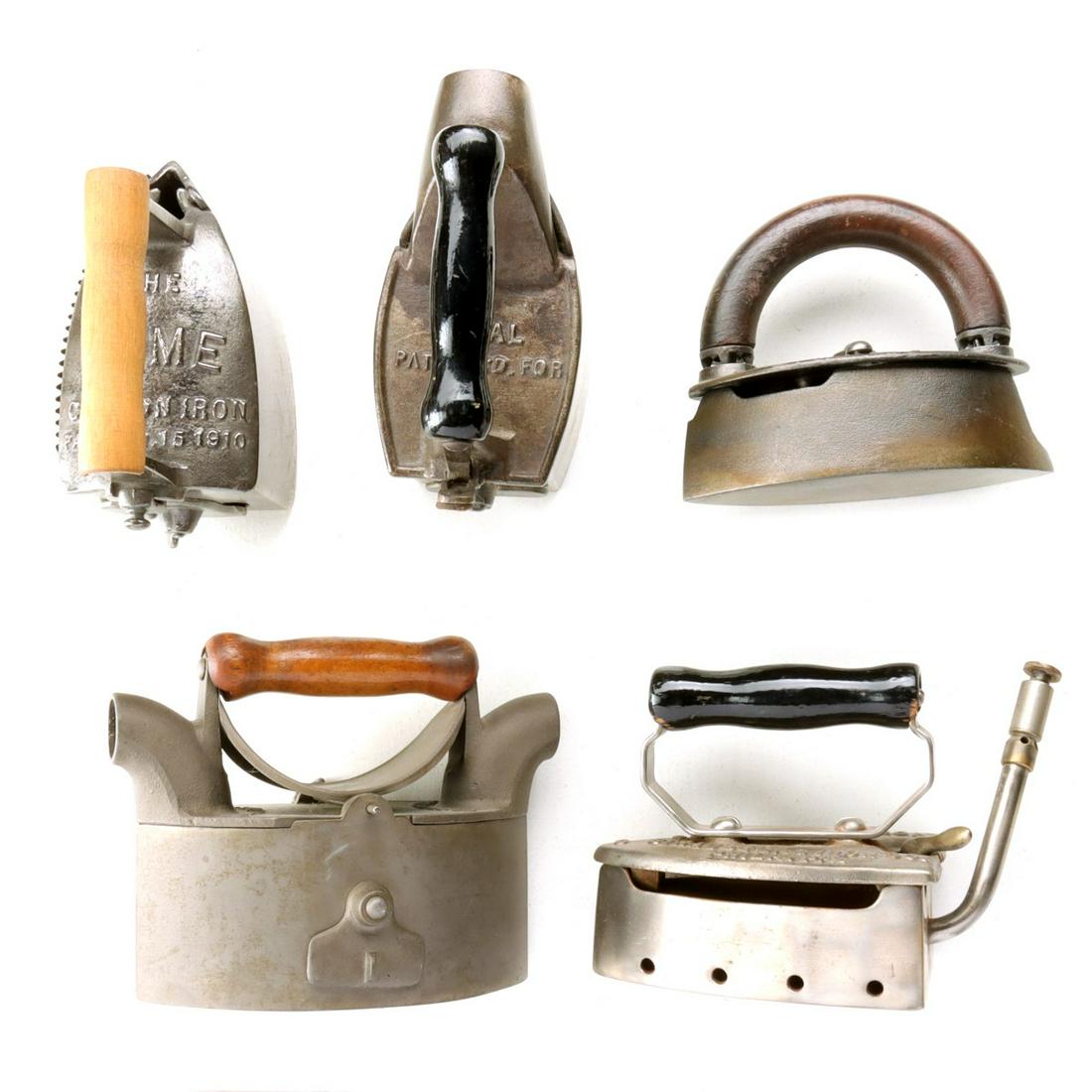 FIVE ANTIQUE GAS AND CHARCOAL IRONS: The collection as shown. Sizes range from 5.75 x 7 x 3.5 to 7 x 7.5 x 3.5 inches. We happily provide seamless in-house packing and shipping services on nearly everything we sell. Until further notice,