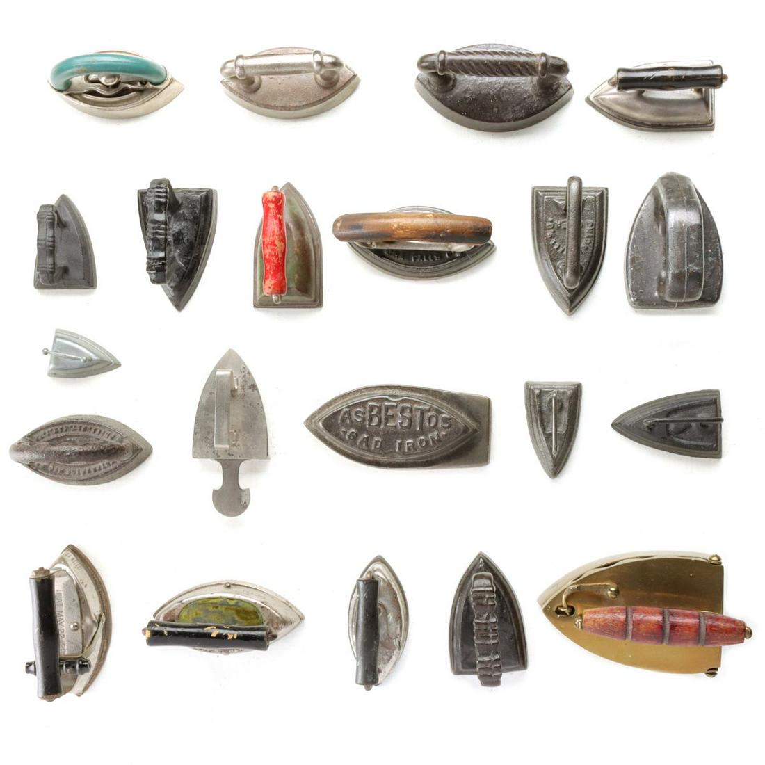 A GROUP OF MINIATURE AND TOY IRONS: Twenty-one collectible, miniature and toy irons as shown. Sizes range from 2 to 4.5 inches. We happily provide seamless in-house packing and shipping services on nearly everything we sell. Until furth
