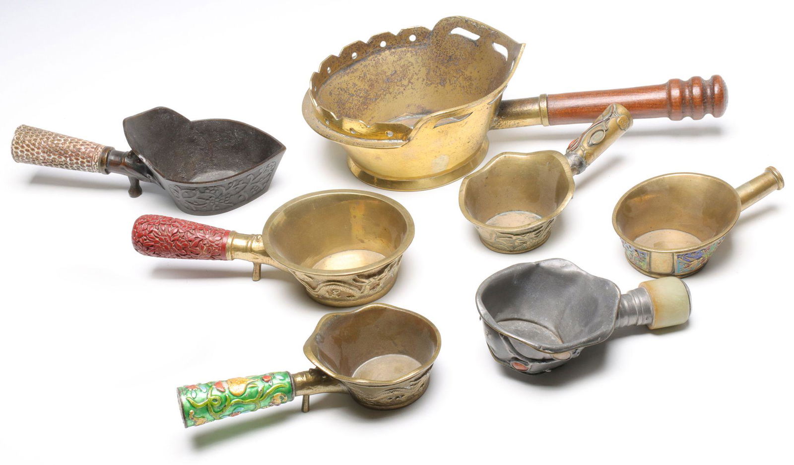 A COLLECTION OF CHINESE SILK IRONS (1 of 15)