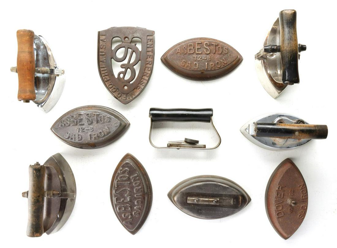 A COLLECTION OF ANTIQUE SAD IRONS (1 of 12)