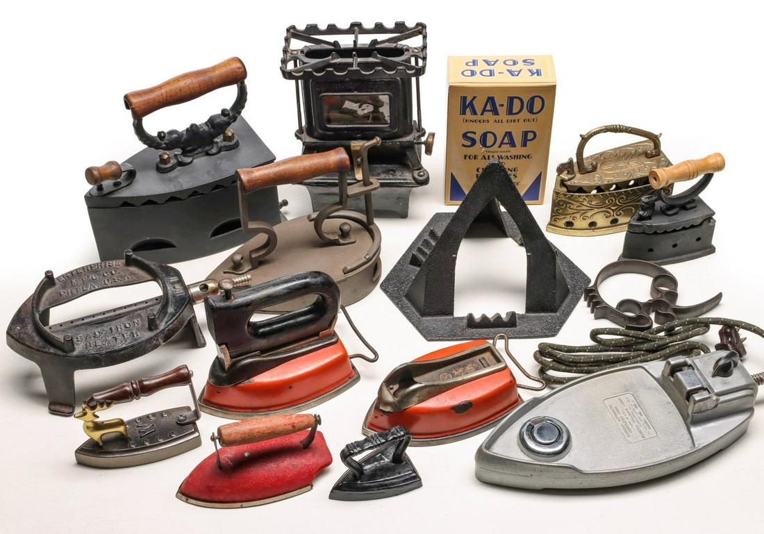 A GROUP OF COLLECTIBLE IRONS AND ACCESSORIES: Fifteen items as shown. Sizes range from 2.5 x 3.25 x 2 to 8.25 x 8.25 x 3.75 inches. We happily provide seamless in-house packing and shipping services on nearly everything we sell. Until further not