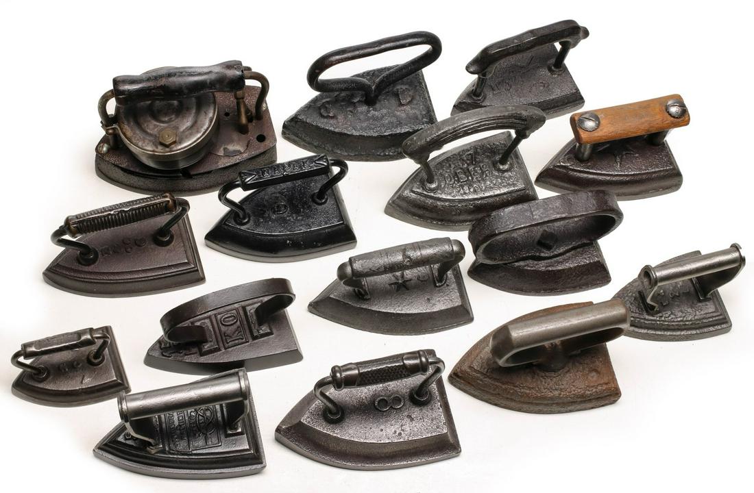 A COLLECTION OF ANTIQUE SAD IRONS (1 of 10)