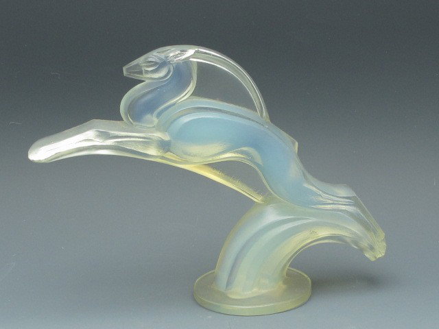 A SABINO GLASS GAZELLE: Sabino, Paris signed leaping gazelle, measures 4.5 x 6 inches. Sabino sticker to bottom.