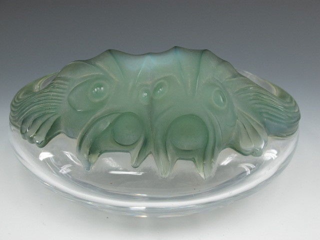 A LALIQUE 'YESO' PATTERN BOWL: Design attributed to Marie-Claude Lalique, with stylized green fish on clear bowl. Signed 'Lalique, France' to bottom. Measures 4 x 9.5 inches.