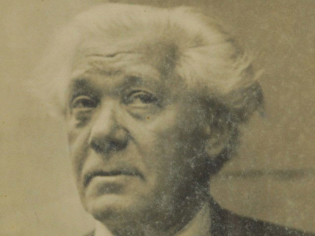 ABRAHAM WALKOWITZ SIGNATURE AND PHOTO: Clipped signature 'A. Walkowitz' matted beneath a photo of him, inscribed 'Photograph of Abraham Walkowitz by Fred Stein,' to reverse. 11-1/2 x 8-1/4 inches overall.