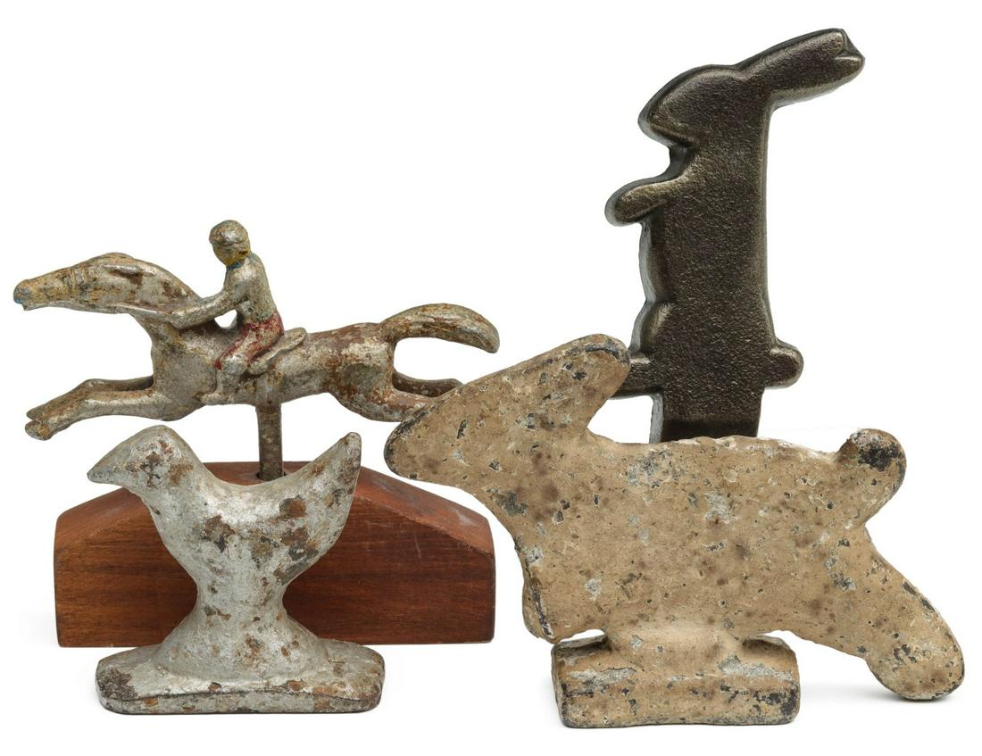 A COLLECTION OF EARLY 20TH C. SHOOTING GALLERY TARGETS: Carnival targets include: 1. A cast iron figural rabbit spinner target, impressed 117 on the base. 2. A cast iron knockdown bird target in a painted silver finish, no marks. 3. A cast iron knockdown r
