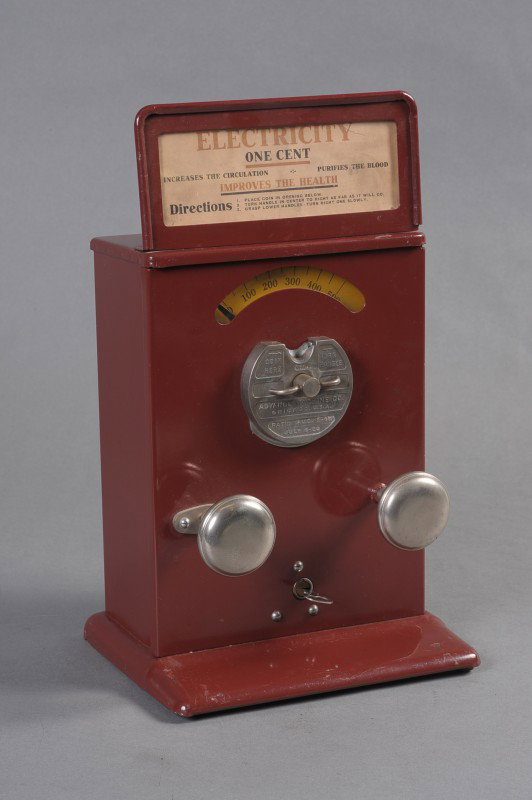 COIN OP SHOCK MACHINE BY ADVANCE MACHINE CO: Advance Machine Company's novelty arcade coin-operated machine that for one cent, says on the marquee it 'increases the circulation, purifies the blood, improves the health.' Right knob apparently con