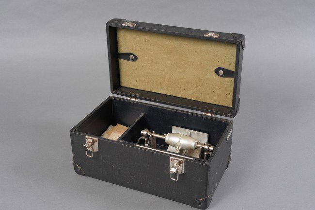 PADGETT-HOOD DERMATOME KIT CIRCA 1948: Antique medical device made for excising skin for grafting. Includes extra blades in labeled cardboard sleeves, partial can of Dermatome Cement. Device patent marked 2288709 and 2435278, corresponding