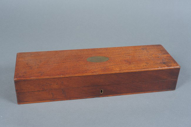 A 19TH CENTURY SURGICAL AND AMPUTATION KIT: Antique medical set with a capital saw and smaller saw, three surgical knives maker marked 'A.S. Aloe' on ricasso, plus a Sharp marked scalpel, and a tourniquet. All in form-fitted surgeon's case, two