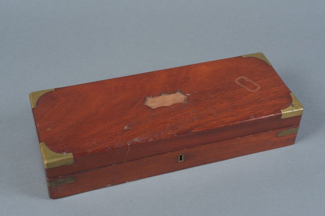 A 19TH CENTURY SURGICAL AND AMPUTATION KIT: Antique medical set with a capital saw, Hey's saw, and smaller saw, three surgical knives, one unmarked, others maker marked 'Sharp,' and 'Shepard & Dudley,' to ricasso, plus a Sharp & Smith marked pi