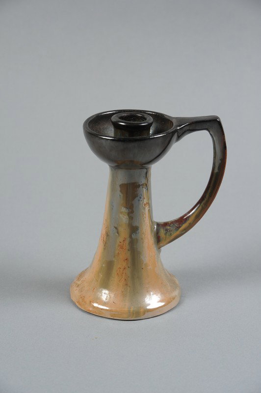 A FULPER ART AND CRAFTS CHAMBER STICK: An art pottery chamberstick, signed by ink stamp, 6"x4.5"x3.5".