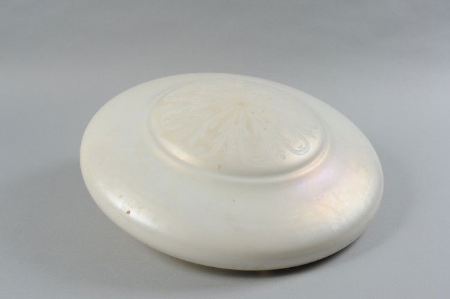 A STEUBEN CALCITE CUT BACK SHADE: An 18" cut back shade engraved with designs in the central area overall. Unsigned with overall measurements of 5" x 18".