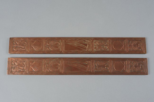 TIFFANY STUDIOS NAUTICAL PATTERN BLOTTER ENDS: Signed Tiffany Studios, New York, #1840, the scarce "Nautical" pattern, polished bronze without patina. Measures 19.5" x 2.5" each.