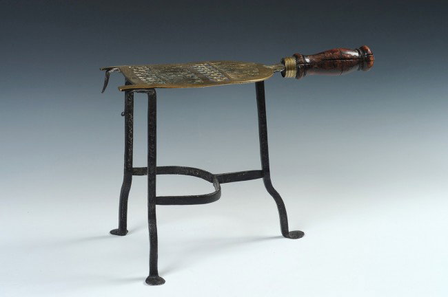 A 19TH C. FIREPLACE TRIVET WITH BRASS: Measures 9.25 x 14 x 6.25 inches.