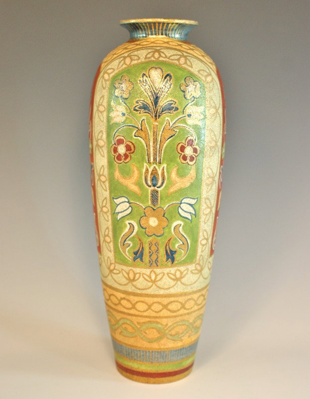 A ROYAL BONN TAPESTRY VASE WITH PERSIAN MOTIF: Tall vase with Persian motif, signed with Royal Bonn mark. Stands 11 inches.