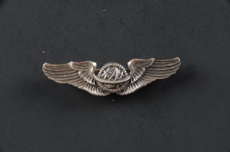US AAF WWII 2'' NS MEYER STERLING NAVIGATOR WING: Die struck, sterling and 'N.S. Meyer, New York' marked pinback, 2 inches, 7 grams.