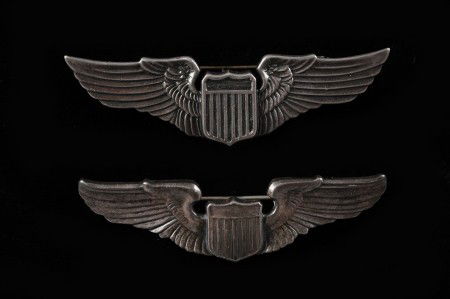 TWO US WWII PILOT WINGS NAMED TO SUSAN WALTNER: Two full size pilot wings, both with engraved name 'Susan V. Waltner,' sterling marked wing dated March 6, 1941, other is the 3.25 oversize wing, and dated 3-6-42. Both pin backs. Interesting pre and