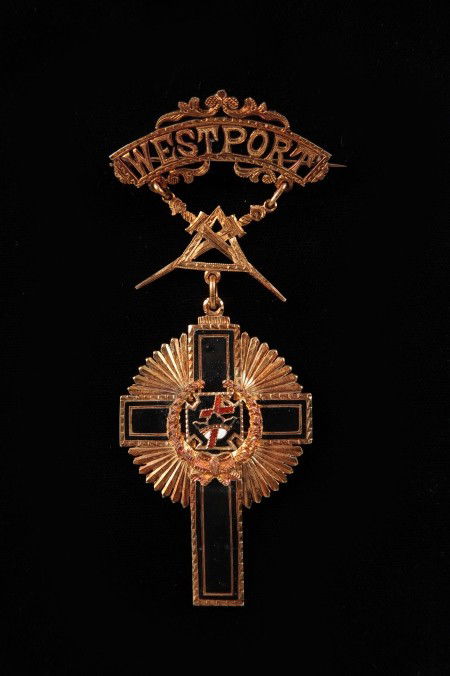 KNIGHTS TEMPLAR WESTPORT COMMANDERY 68 BADGE: Multi-piece construction with cut-out 'Westport' pin back brooch, suspended masonic triangle and swords, and suspended KT cross in black enamel, with enamel cross applied to center, with enamel cross