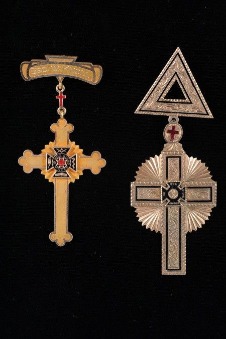 TWO TEUTONIC KNIGHTS GOLD & ENAMEL CROSS BADGES: Includes a frosted gold cross Pomme with applied enamel TK in center, 10K marked and engraved name on brooch 'Geo. W. Knoll,' reverse engraved 'Poplar Bluff Commandery No 67, 1922,' measures 3 x 1-3/8