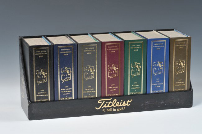 TITLEIST TIGER WOODS COMMEMORATIVE SERIES GOLF BALL SET: Includes seven book-form volumes containing commemorative golf balls for Woods' 1996 Las Vegas Invitational, 1996 Walt Disney / Oldsmobile Classic, 1997 Mercedes Championships, 1997 Asian Honda Classi