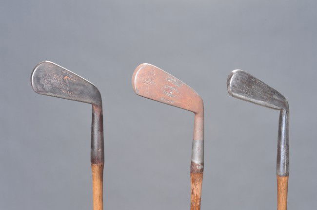 THREE ANTIQUE WOOD SHAFT GOLF CLUBS: Includes a G. Charles Special Sammy, MacGregor mid-iron, and a J.L. Hutchinson special.