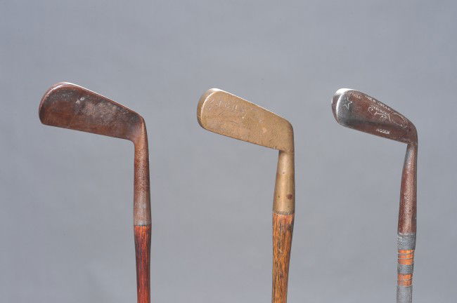 THREE ANTIQUE WOOD SHAFT GOLF CLUBS: Includes a Gibson & Co. jigger; Slazenger putter, and a Lowe & Campbell Fairview mid-iron.