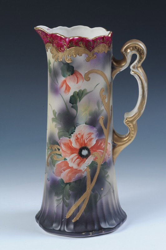 A ROYAL NIPPON HAND PAINTED TANKARD: Florals on matte ground, measures 12" x 6".