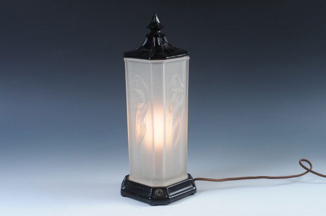 AN ART DECO LIGHT WITH FROSTED NUDES: Attributed to McKee, a tag with this item states that it was won at a Sedalia, Mo. Carnival in the 1930s. Measures 14 x 5 inches.