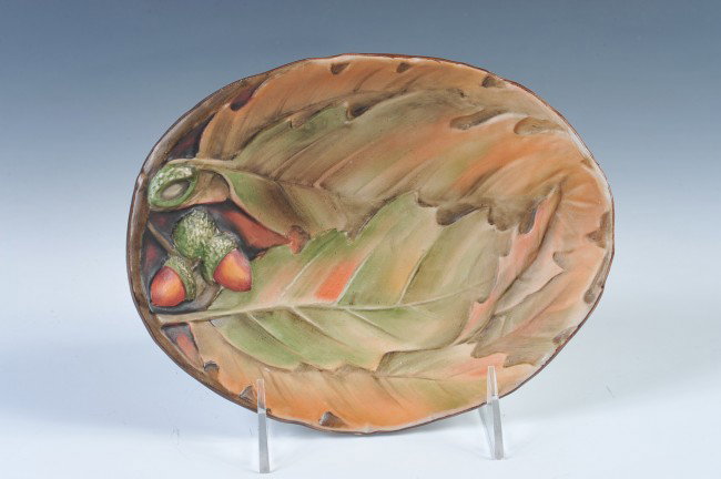NORITAKE NIPPON DISH WITH BLOWN OUT ACORNS: Green mark Noritake Nippon dish with somewhat blown out acorns and heavily embossed leaf details, measures 8 x 6.25 inches.