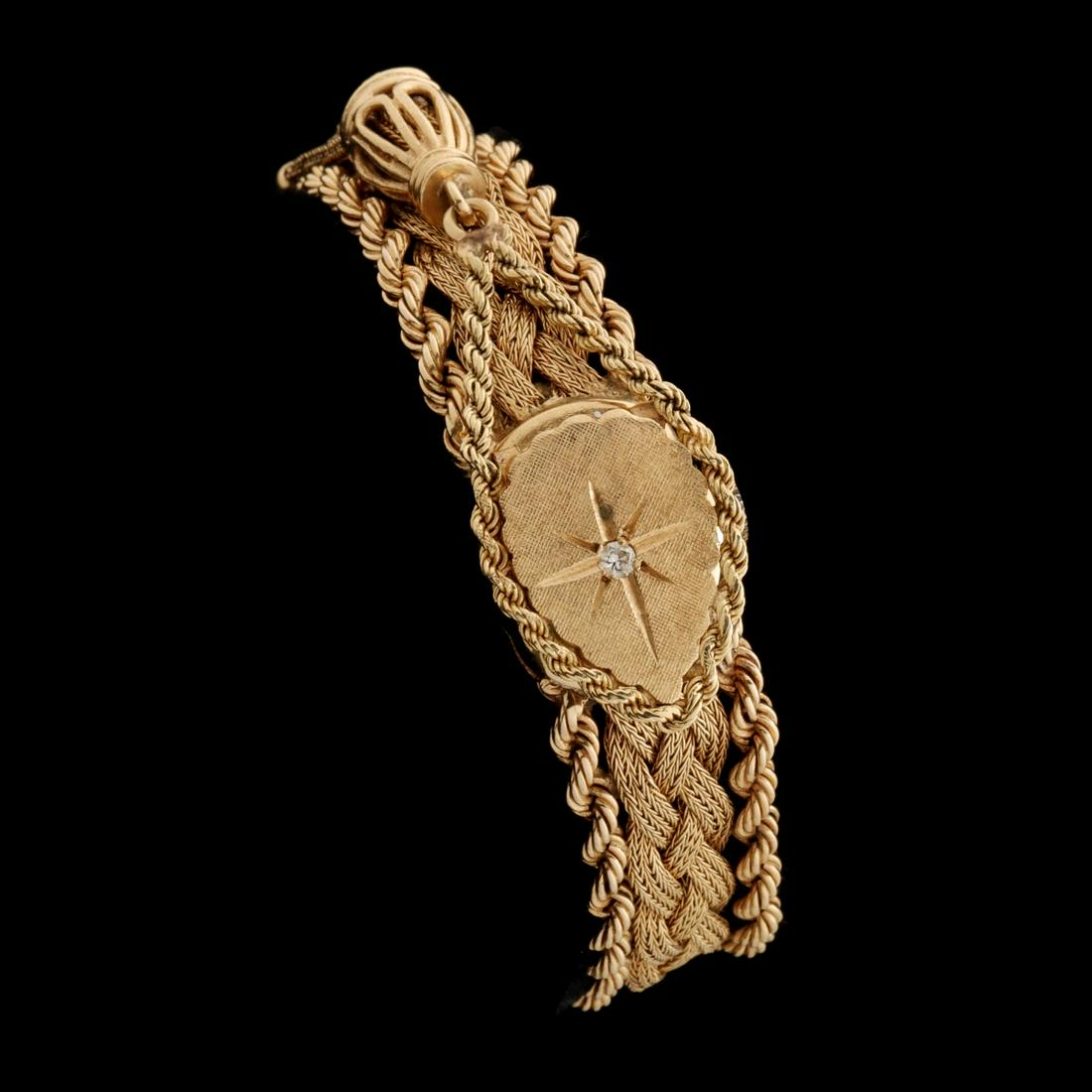 A 14K HIDDEN WATCH ON 14K GOLD WOVEN MESH BAND (1 of 16)