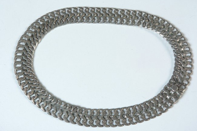 A MEXICAN STERLING SILVER BRAIDED CHOKER: Fine braided choker, marked 'Sterling, Mexico' to end. 16 inches long, 2.35 oz.