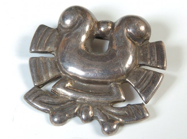 A WILLIAM SPRATLING STERLING SILVER BROOCH: Signed 'Spratling, made in Mexico' and 'Spratling Silver,' approximately 1.25 x 1.5 inches, weights approximately 15 grams.