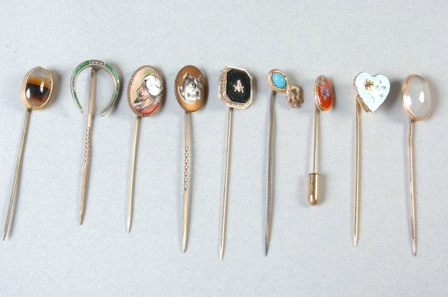 NINE ANTIQUE VICTORIAN STICKPINS: Includes a 'R&N 14K' marked pin on the Masonic stickpin; an enamel painted bulldog, blue guilloche style heart, Arabic figure, serpent and blue stone and red enamel floral oval, green enamel horseshoe