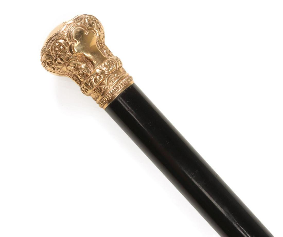 A SIMONS BROTHERS GOLD CROWN WALKING STICK (1 of 11)