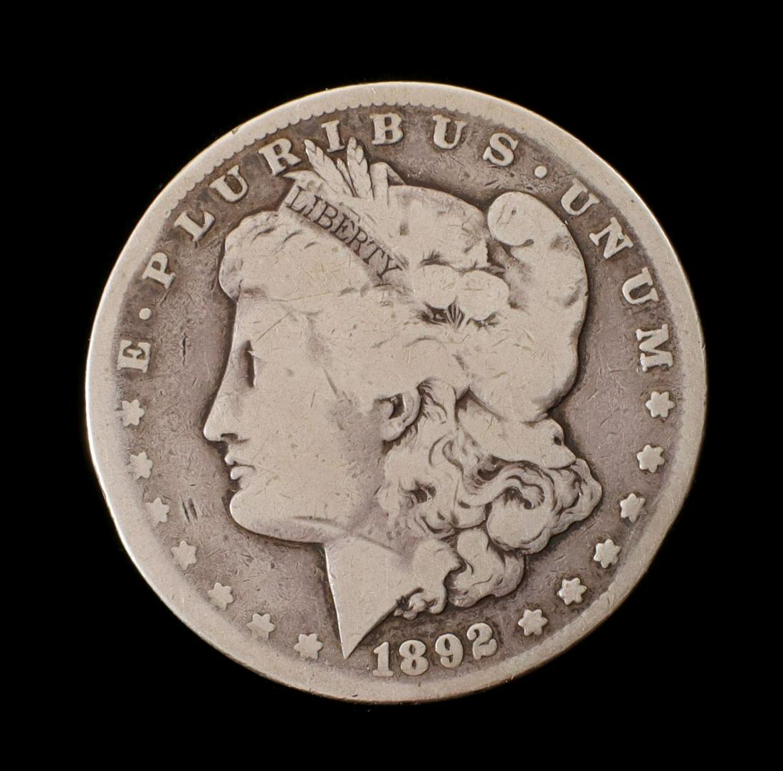 AN 1879 CARSON CITY KEY DATE MORGAN SILVER DOLLAR (1 of 2)