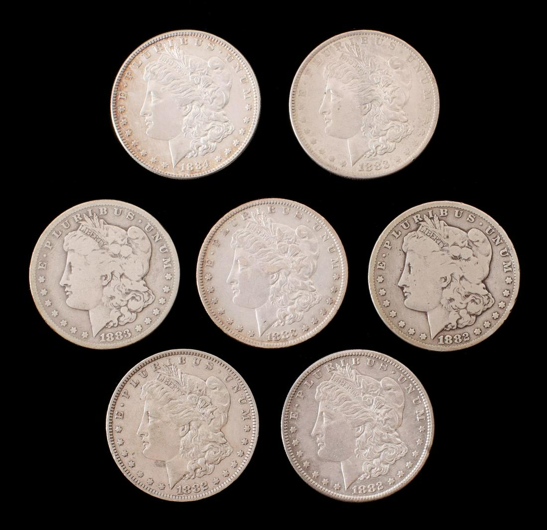 SEVEN MORGAN SILVER DOLLARS INCLUDING 1882CC (1 of 10)