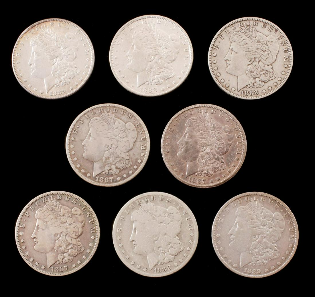 EIGHT MORGAN SILVER DOLLARS (1 of 12)