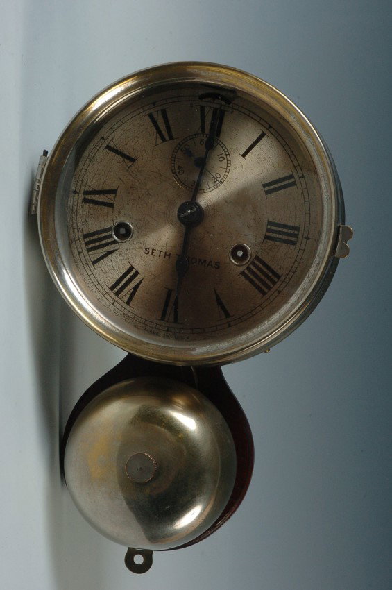 A SETH THOMAS ‘BELL UNDER’ MARINE CLOCK
