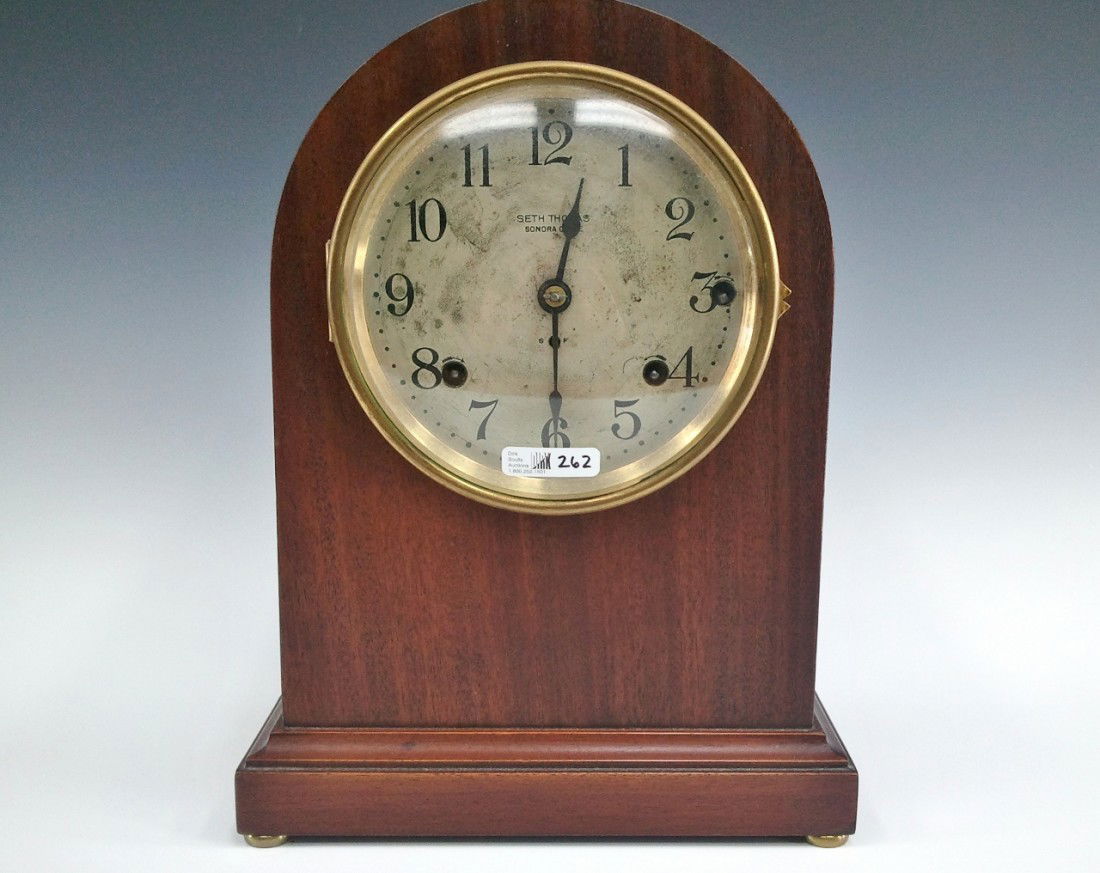 A SETH THOMAS SENORA CHIME MANTEL CLOCK: Nice mahogany case, silvered metal dial with 30% wear, chimes on each quarter hour and sounds the hour, measures 13.5 x 10.25 x 7 inches overall.