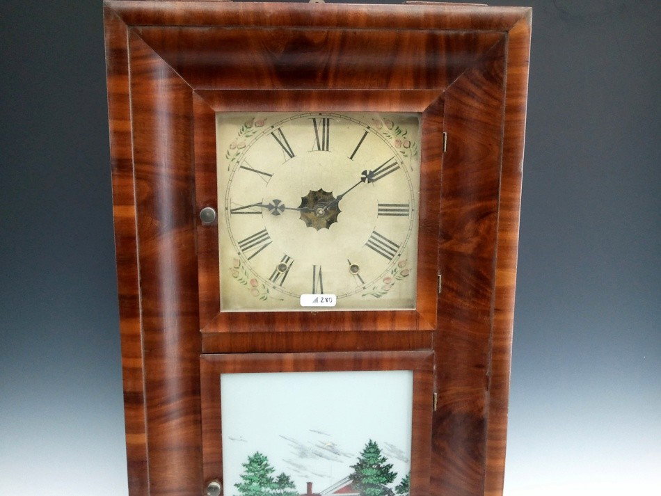 A WESTON BROS TWO DOOR OGEE SHELF CLOCK: Measures 29.75 x 16.5 x 4.5 inches overall.Replaced dial and repainted lower tablet.