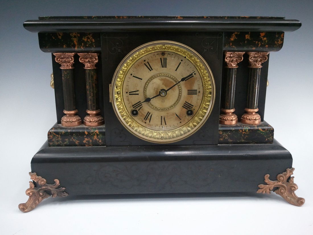 A SETH THOMAS ADAMANTINE MANTEL CLOCK: 10.75 x 7 x 16.5 inches overall.