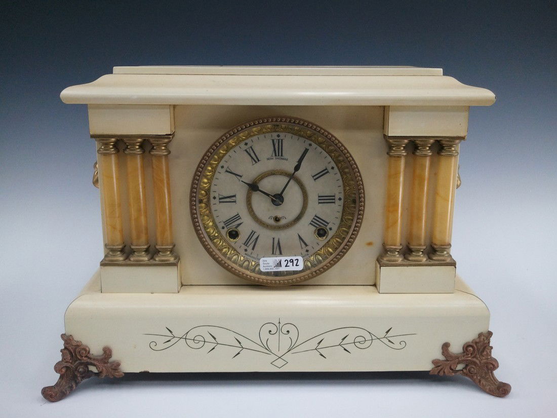 A SETH THOMAS WHITE MANTEL CLOCK: Time and strike, eight day. 11 x 16 x 6.75 inches overall.