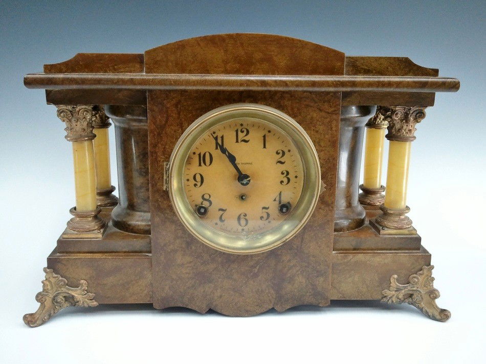 A SETH THOMAS OPEN COLUMN ADAMANTINE CLOCK: 11 x 16.5 x 6.5 inches overall.