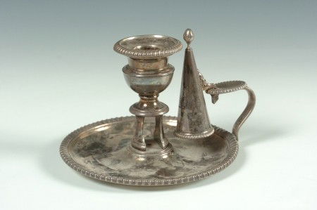 A MATTHEW BOULTON CHAMBER STICK & SNUFFER: With family crest engraved on the snauffere, bobeche and saucer, measures 4 x 5.5 inches, signed under the base.