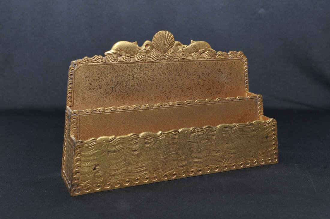 RARE TIFFANY STUDIOS 'NAUTICAL' PATTERN LETTER HOLDER: Rare Tiffany Studios 'Nautical' pattern letter holder, 7 x 11 x 2.5 inches, signed 'Tiffany Studios, New York, 1849.' Parcel gilt finish over bronze.