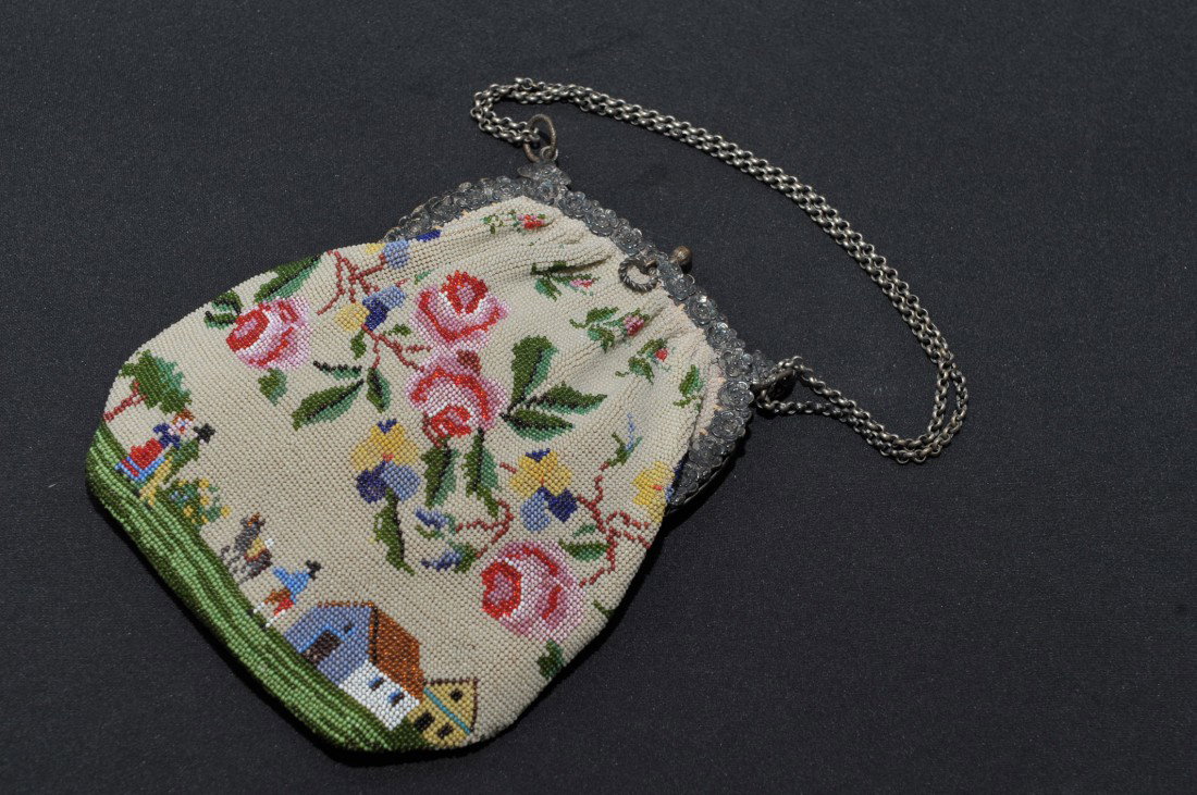 LARGE FINE VICTORIAN BEADED PURSE W/COUNTRY SCENE: Florals and 18th century country scene, Unmarked ornate silvere colored frame, original satin lining with gold thread piping with rosettes. Measures 7.5 x 6.5 inches.
