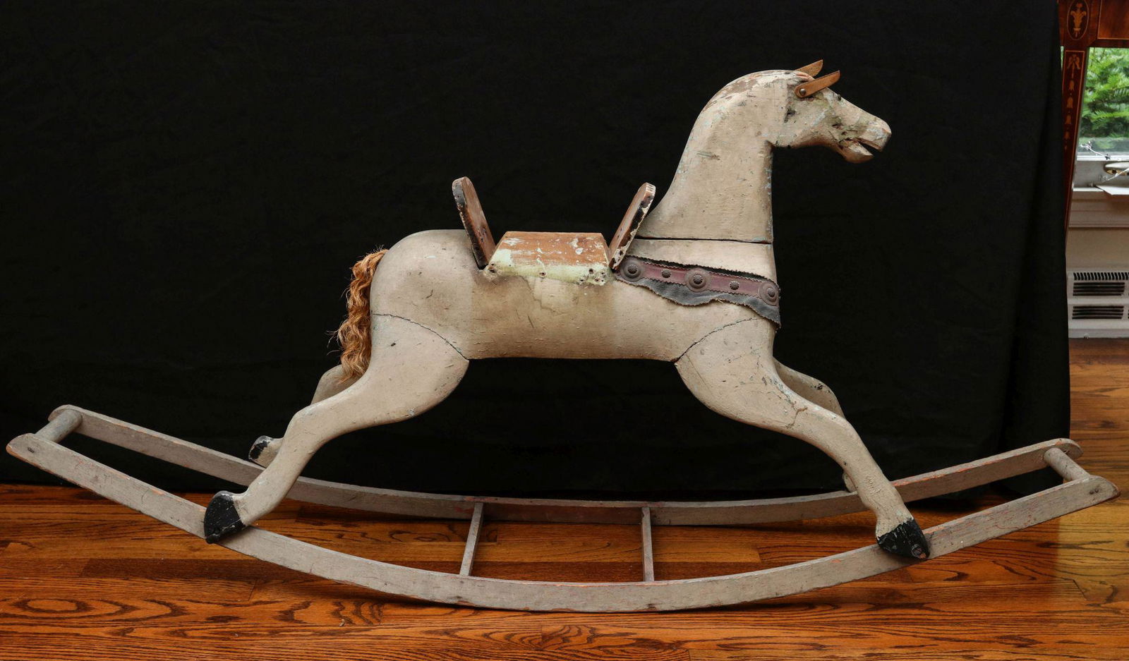 A 19TH CENTURY CARVED AND PAINTED ROCKING HORSE (1 of 8)